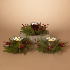 10" Rustic Faux Pine And Berry Christmas Decorative Floral Candle Ring With Metallic Silver Glass Votive Candle Holder