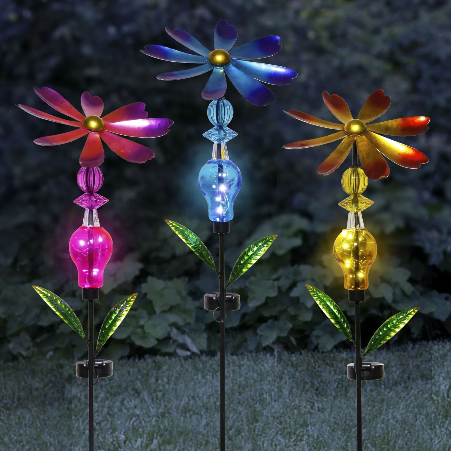 Bejeweled Metal Spinning Floral Solar Stake Light 1 Bejeweled Metal Spinning Floral Solar Stake Light